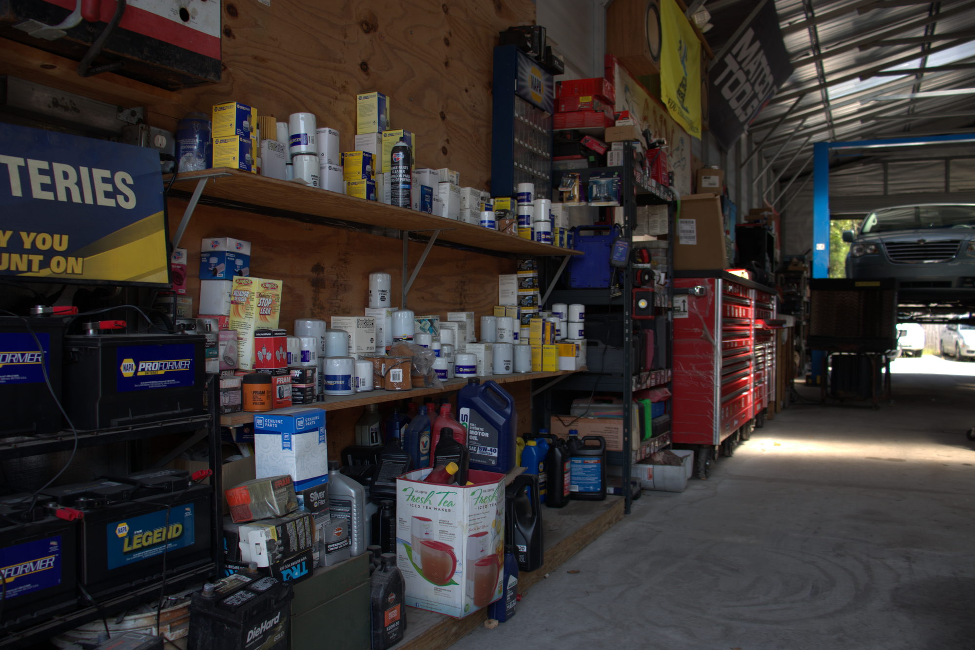 Stocked parts aisle inside the shop