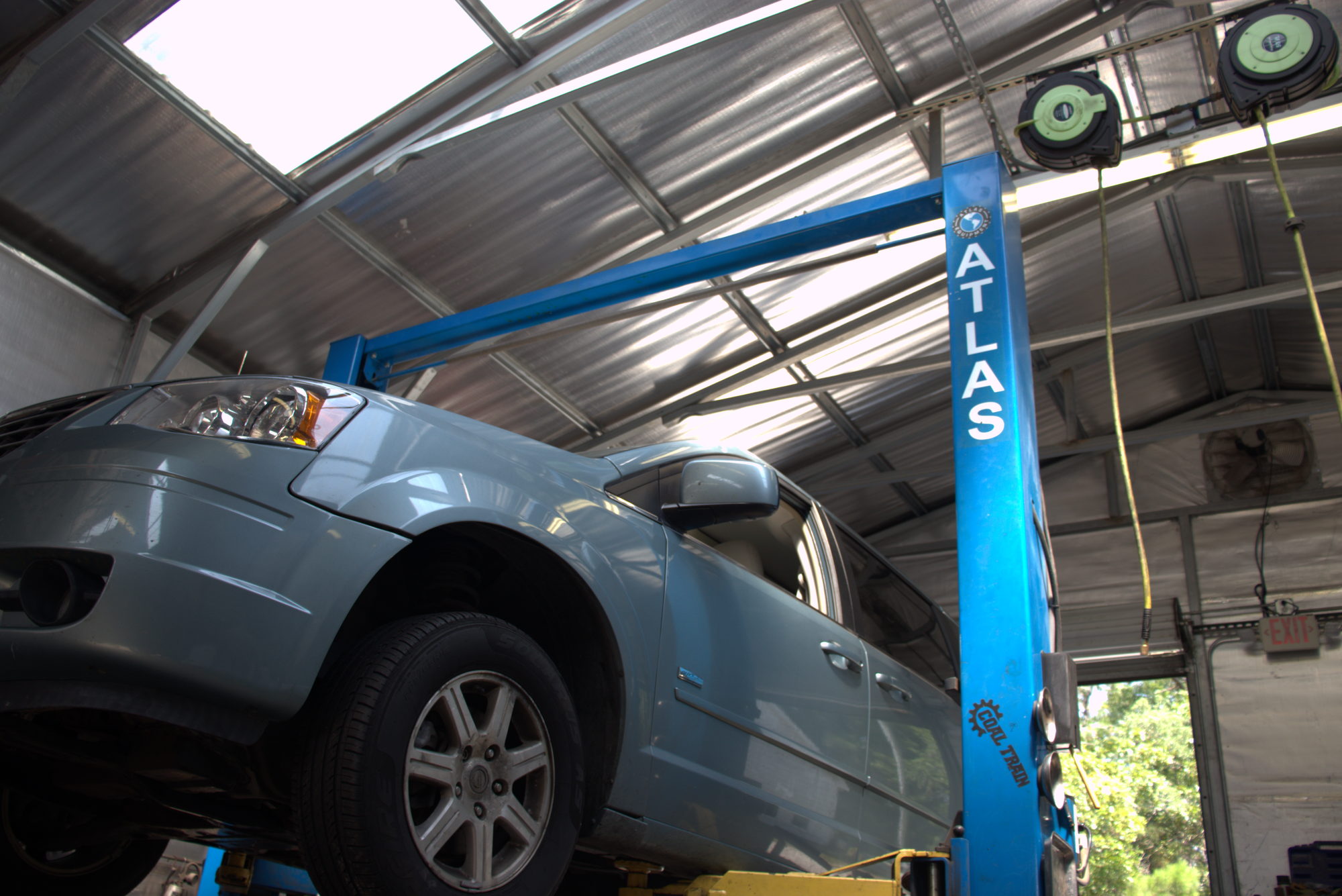 Work van raised on the shop lift