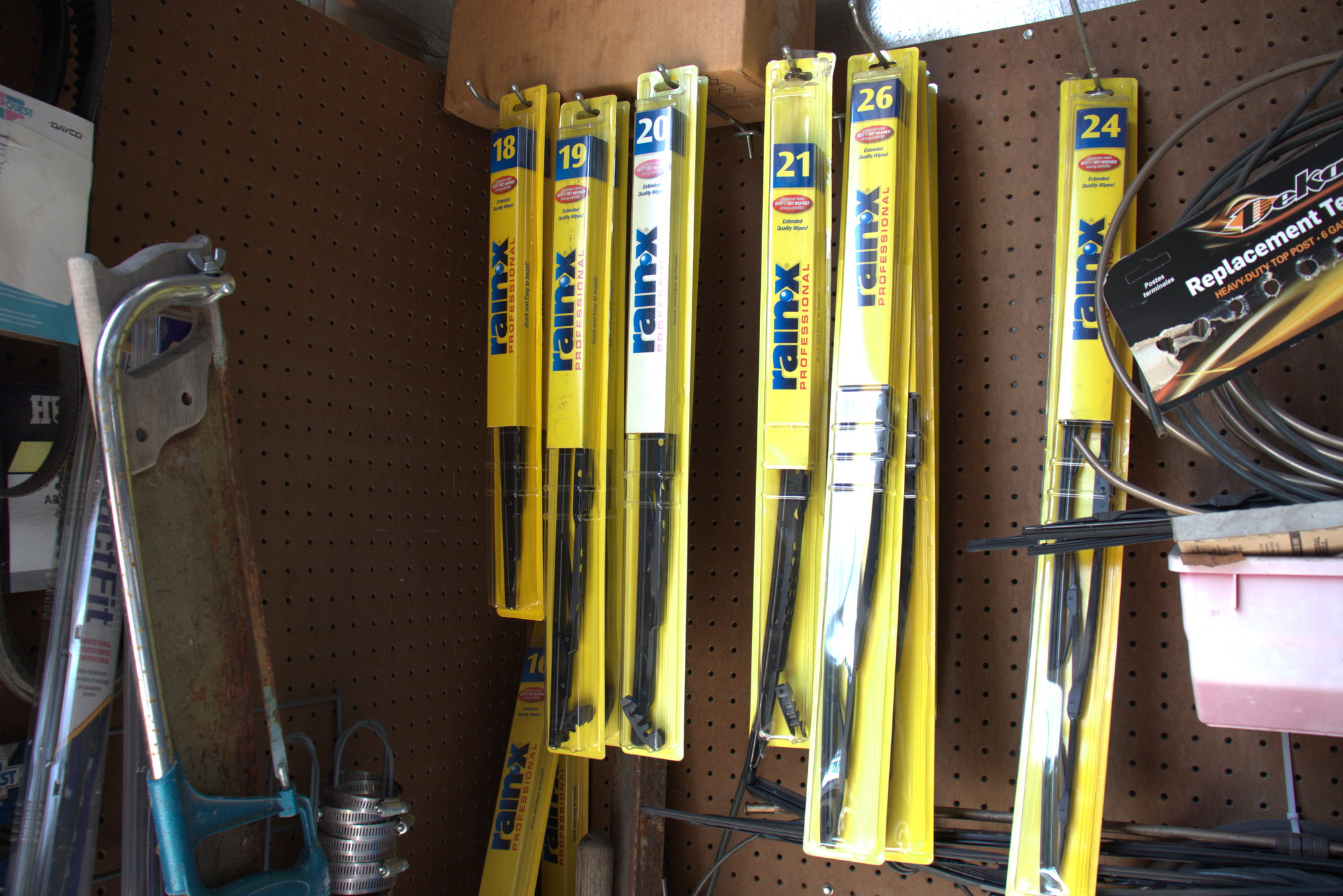 Boxed wiper blades and small parts stocked on the supply shelf
