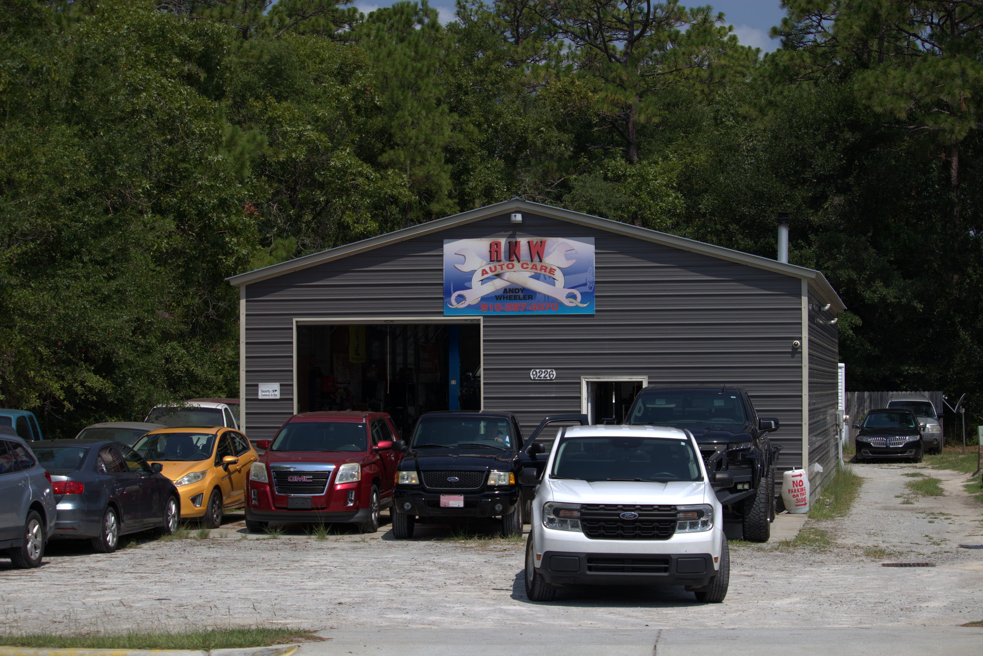 Front of the ANW Auto Care shop showing the service bay entrance in Calabash, NC
